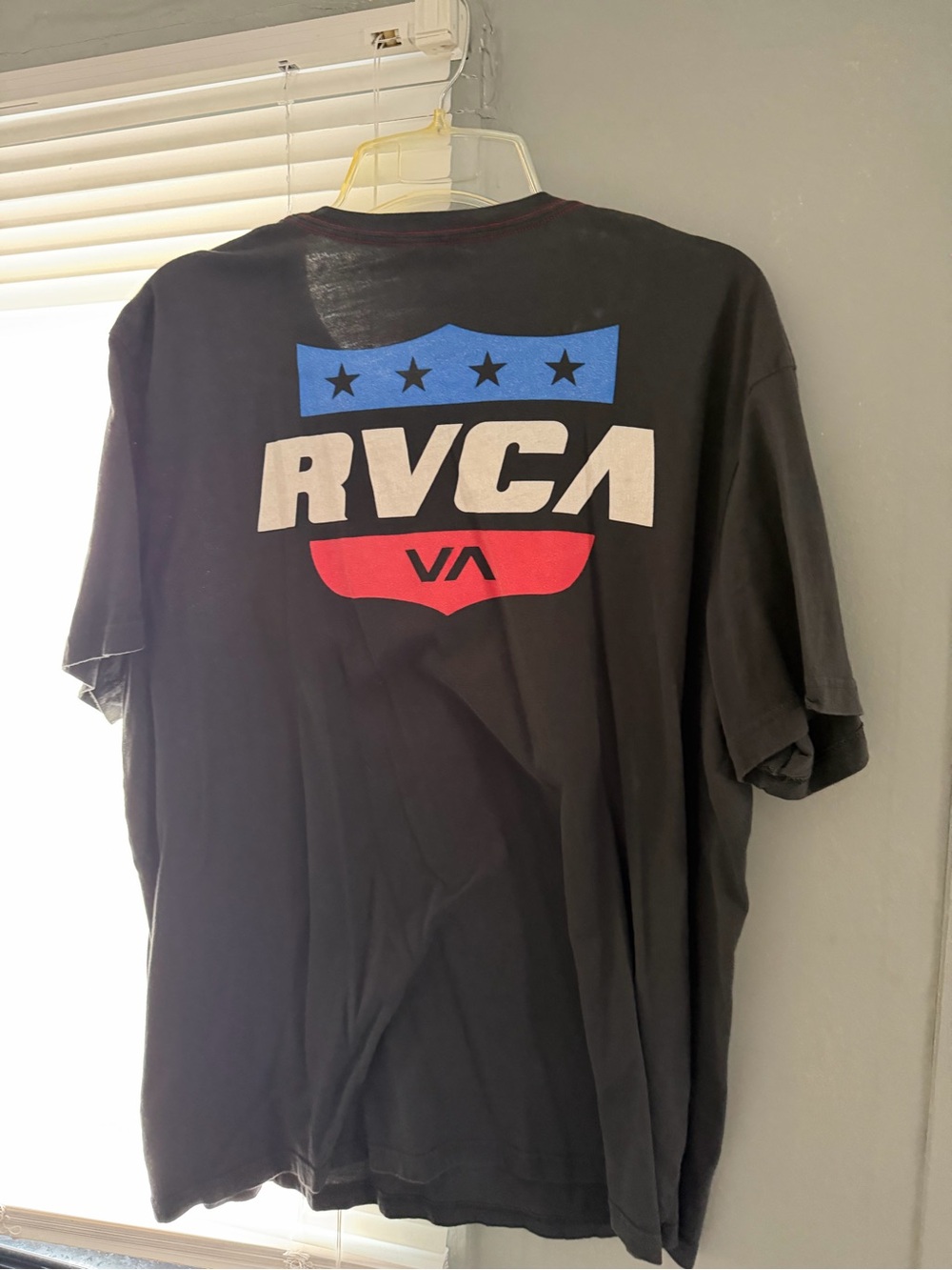 RVCA Black Short Sleeve T-Shirt with Red & Blue Shield Logo